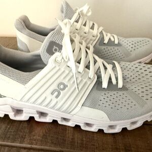 On Running Light Gray and White Athletic Shoes